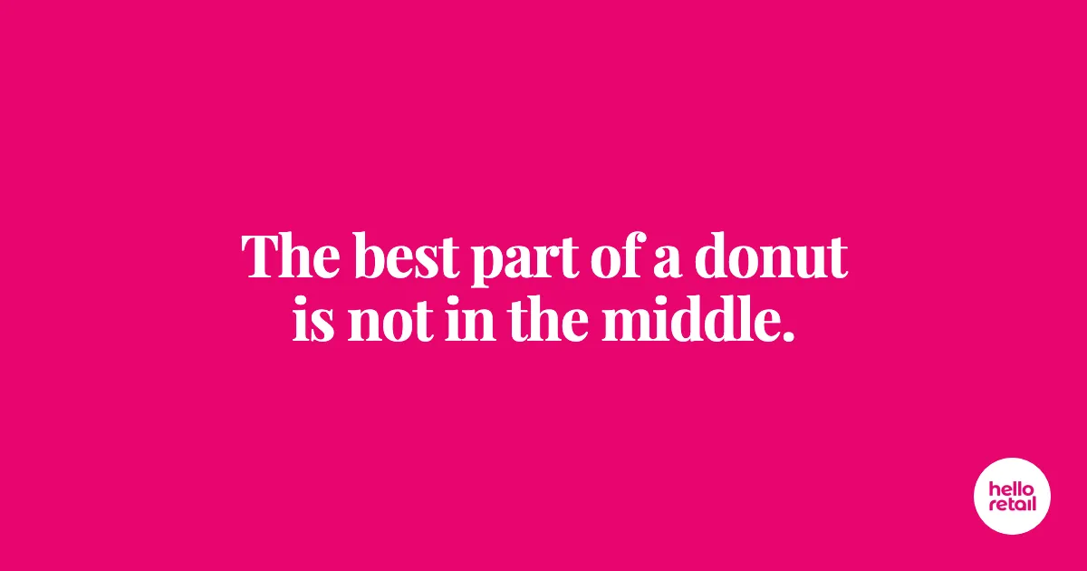 Cerise pink banner with white Playfair Display headline reading 'The best part of a donut is not in the middle.'