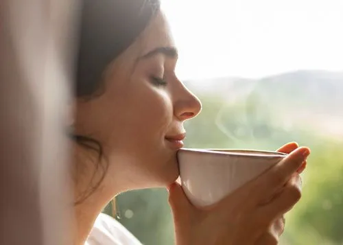 Close Up Woman Drinking Coffee 1