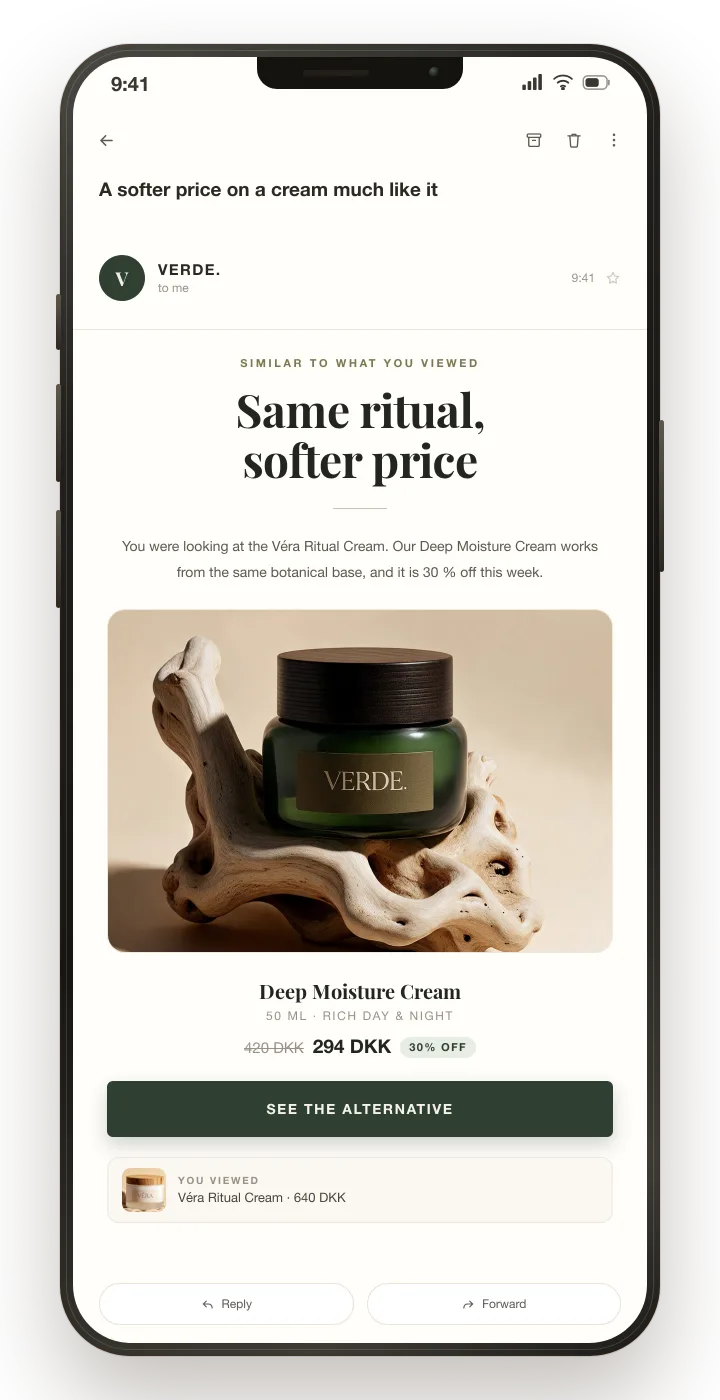A phone showing the email: a softer price on a cream much like it, headed "Same ritual, softer price".